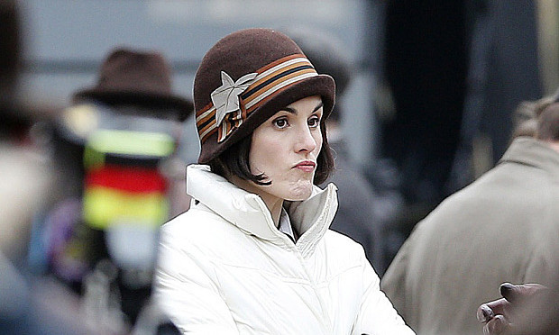 FAMEFLYNET - Exclusive: Downton Abbey Filming In Lacock Village Stopped After Tour Guide Walks On Set
