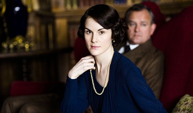 Downton Abbey S5The fifth series, set in 1924, sees the return of our much loved characters in the sumptuous setting of Downton Abbey. As they face new challenges, the Crawley family and the servants who work for them remain inseparably interlinked.MICHELLE DOCKERY as Lady Mary Crawley and HUGH BONNEVILLE as Robert, Earl of Grantham. Photographer: Nick Briggs